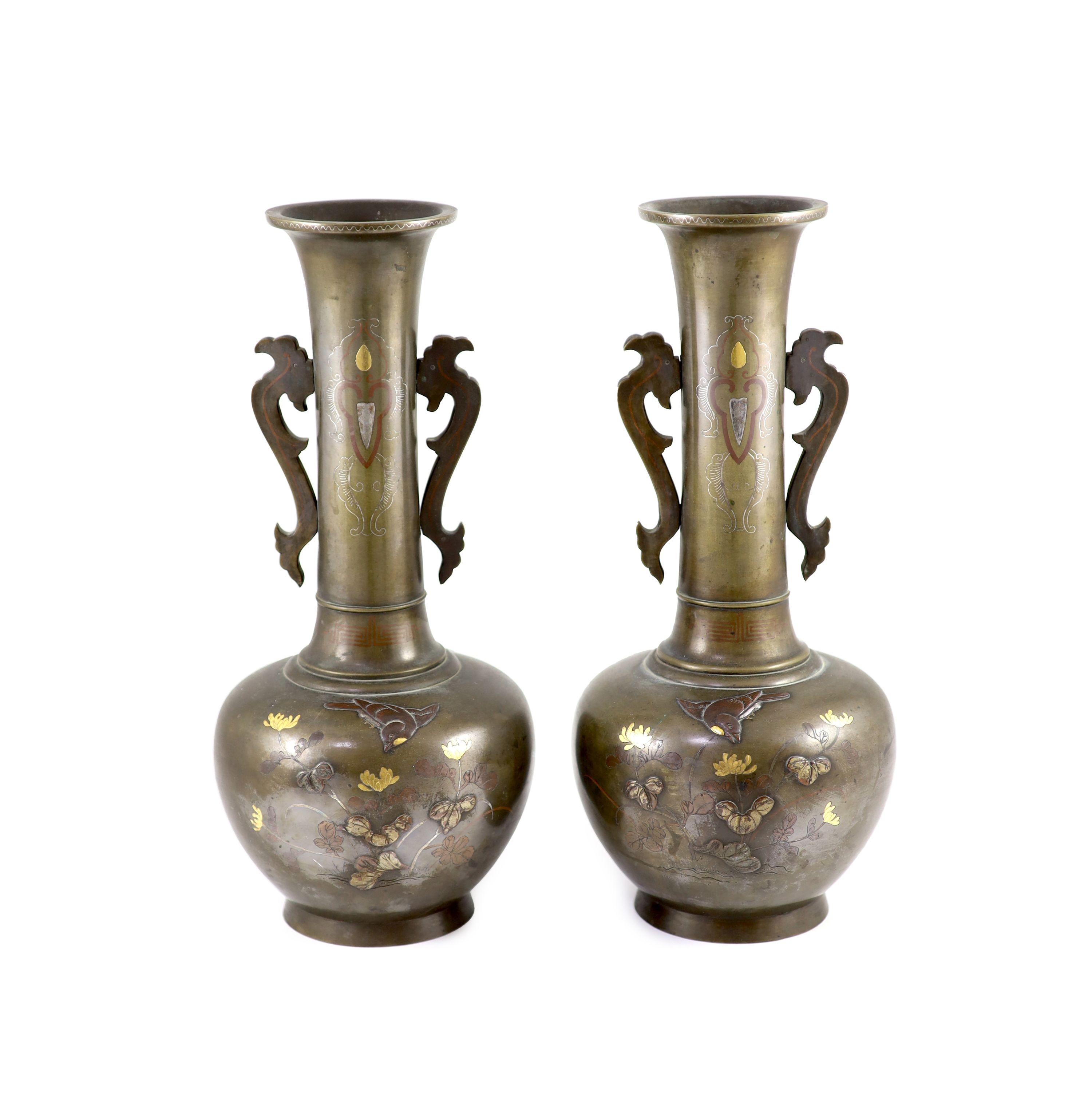A pair of Japanese bronze and mixed metal bottle vases, Meiji period, 36cm high, patchy patina